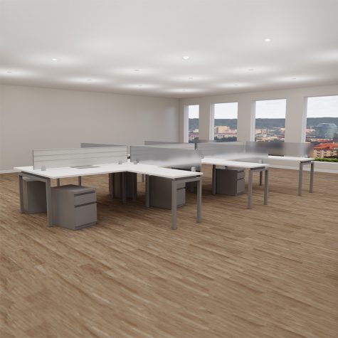 A spacious open office featuring multiple desks and chairs arranged for collaborative work.