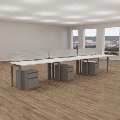 A spacious open office featuring multiple desks and chairs arranged for collaborative work.