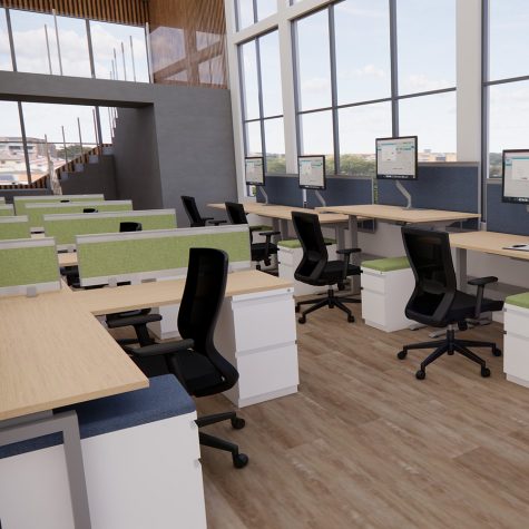 A spacious open office featuring multiple desks and chairs arranged for collaborative work.