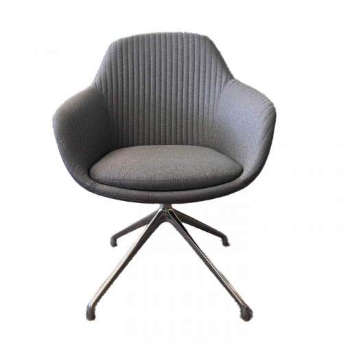 A modern, gray upholstered chair with a curved back and armrests. The seat has a soft cushion, and the chair features a four-legged metal base with a swivel design. The backrest has vertical stitching for added texture.
